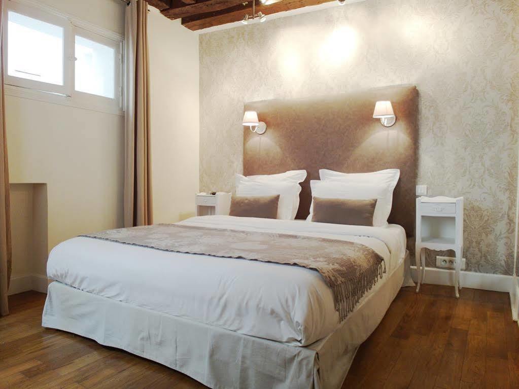 Louvre Parisian ChicSuites Extérieur photo